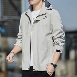 Men's light grey hooded windbreaker jacket with zip pockets and adjustable cuffs