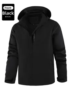 Detail of waterproof black hooded outdoor jacket with EXPLORE lettering and Velcro cuffs