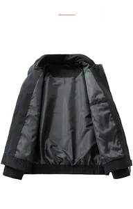 Detailed interior view of a black zip-up jacket with smooth lining and inner pocket