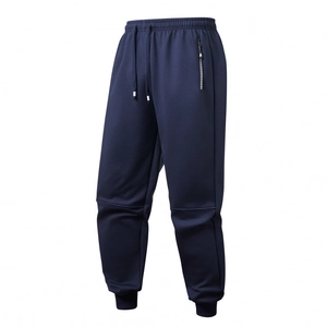Men's navy sherpa lined joggers with drawstring waist and zip pocket detail