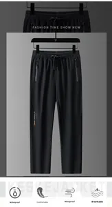 Pantaloni sportivi da uomo con coulisse elastica in vita e tasche con cerniera impermeabile