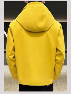 Rear view of minimalist yellow hooded windbreaker jacket with premium windproof fabric