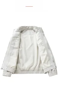 Detail of soft inner lining and hidden pocket on a men's outdoor windproof jacket
