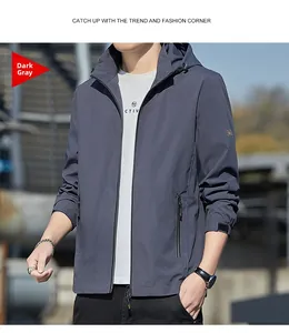 Detail view of the adjustable velcro cuff on this dark grey men's outdoor jacket