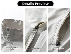 Detail of stand collar, smooth zipper and side pockets on outdoor jacket
