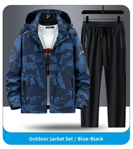 Detail of blue camo windbreaker jacket with velcro cuffs and matching black sports pants