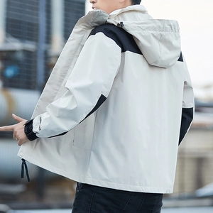 Outdoor hooded windbreaker jacket for men and women with color-blocking design