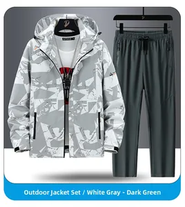 Detail of hooded camouflage jacket and dark green outdoor pants set with drawstring waist