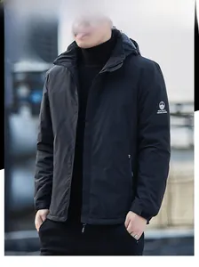 Detail of men's fleece-lined thermal outdoor jacket with a detachable hooded design