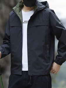 Men's waterproof outdoor hooded jacket in black with olive green contrast lining