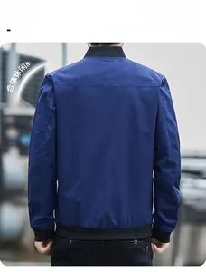 Detail of blue men's casual jacket featuring ribbed stand-up collar and back seam stitching