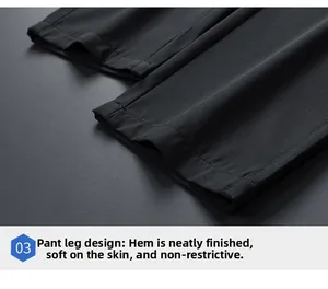 Dettaglio macro delle cuciture e dell'orlo liscio dei pantaloni sportivi neri da uomo