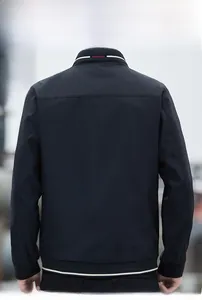 Rear view of black men's jacket showing stand collar with red and white striped detail