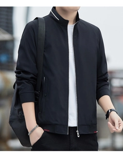 Detail of men's casual stand collar jacket featuring white contrast stripes and ribbed cuffs