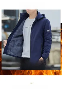 Detail view of winter hooded jacket showing grey thickened fleece lining and navy exterior