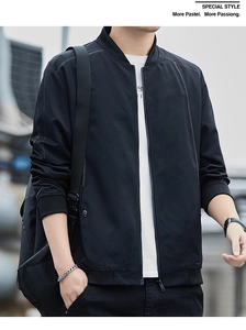 Detail of black baseball collar jacket showing white contrast stitching and ribbed cuffs