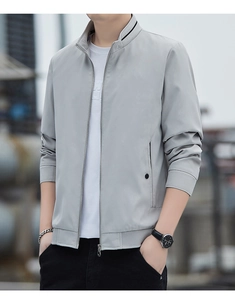Close-up of light grey casual jacket featuring a ribbed stand collar with striped details