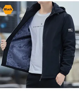 Detail view of men's hooded jacket with warm grey fleece lining and premium zipper pockets