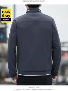 Rear view of a slim fit dark grey jacket for men featuring striped cuffs and hem