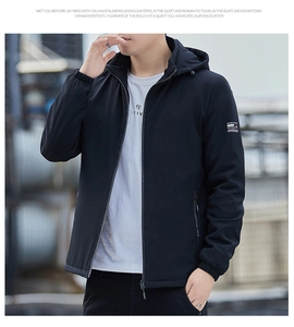 Detail of black hooded jacket with sleeve printing and windproof zipper features