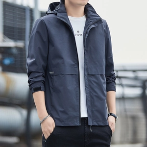 Men's navy blue waterproof hooded jacket with adjustable cuffs for outdoor wear