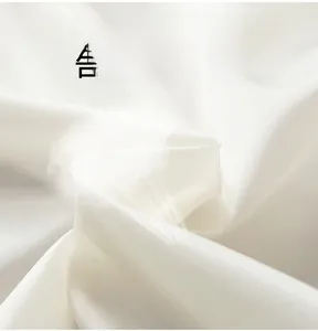 Close-up of premium breathable white fabric texture for windbreaker jacket
