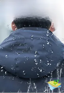 Close-up of waterproof dark blue jacket hood showing water repellent fabric texture