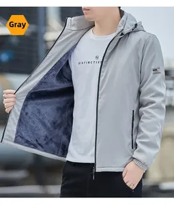 Detail of grey hooded jacket showing windproof fabric and warm thickened fleece lining