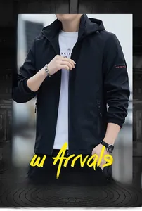 Detail of black men's casual hooded jacket with detachable hood and zipper pocket