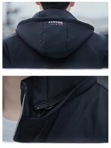 Detail view of the detachable hood with logo on a black fleece-lined windbreaker jacket