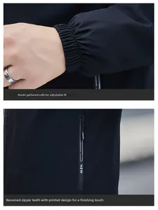 Detail of elastic cuffs and waterproof zippers with fashion logo on black jacket