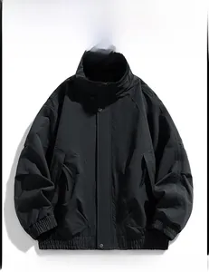 Close-up of black windproof outdoor jacket with stand collar and snap button placket detail