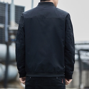 Rear view of men's casual black bomber jacket with stand collar and ribbed hem