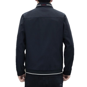 Navy blue men's stand collar jacket with red and white striped ribbing, back view