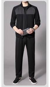 Men's athletic tracksuit featuring a black stand collar jacket with grey color block detail