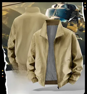 Detail of slant side pockets and ribbed cuffs on a khaki vintage bomber jacket