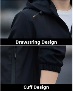 Close-up of black hooded jacket featuring drawstring hood and elastic ribbed cuffs detail