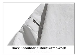 Detail shot of the back shoulder cutout and拼接 seam on a light gray casual jacket