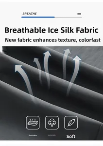 Gros plan sur le tissu en soie glacée gris foncé montrant sa texture respirante et fluide