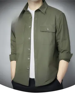 Detail of army green cargo shirt buttoned cuffs with casual long sleeve cotton fabric