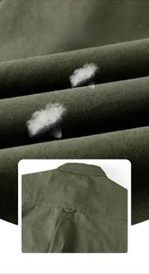 Macro shot of breathable army green fabric texture and military-style back hook detail