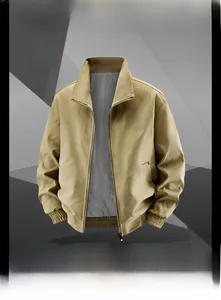 Close-up of khaki cotton flight jacket featuring stand collar and ribbed elastic cuffs
