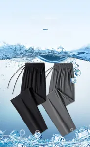 Detail of ice silk fabric men's casual pants with drawstring waist and zipper pocket