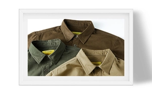 Detail showing stacked high-quality cotton work shirts in olive green, coffee, and khaki