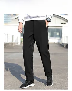 Pantalon de sport extensible noir pour homme avec coupe droite et tissu lisse en extérieur