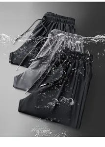 Close-up of quick-dry ice silk sport shorts showing elastic drawstring and breathable texture