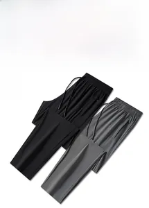 Detail of ice silk sports pants with elastic drawstring waist and hidden zipper pockets