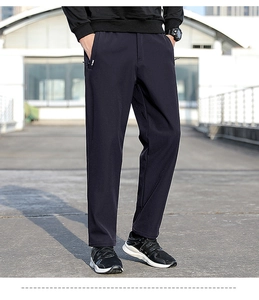 Détail du pantalon de sport élastique pour homme avec poches zippées et taille à cordon