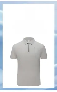 Detail of men's polo shirt with zipper neckline and breathable textured fabric