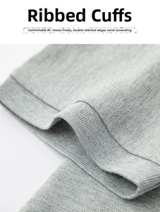 Detail of ribbed cuffs on grey polo shirt with double-needle stitching for durability